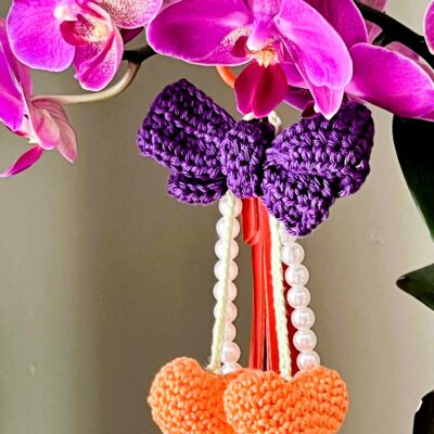 Cherry on the sac orange & violet